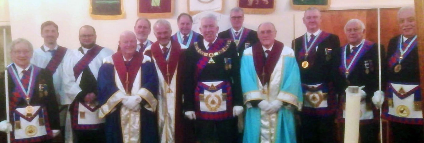 Mark Matthews (centre) with Provincial acting offices, guests and exaltees