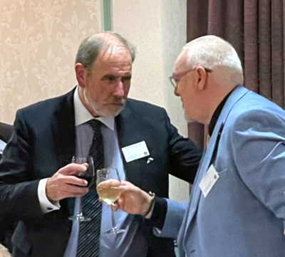 Frank Umbers (left) toasts Ian Green.