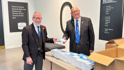 Handing out PSA self-check kits.