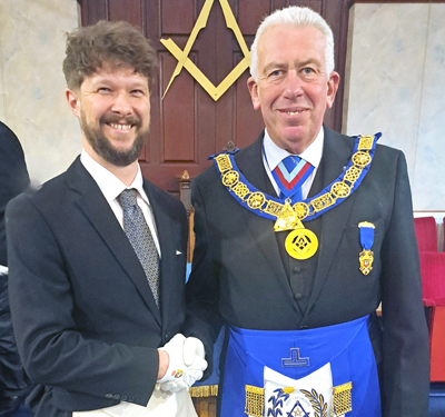 Carl Rothwell being congratulated by Mark Matthews.