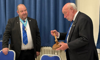 Derek Alty (right) presenting the travelling gavel to Chris Wilson. Derek Alty (right) presenting the travelling gavel to Chris Wilson.