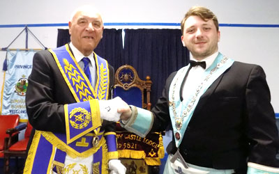 Steven Kayne (left) congratulates Michael Grimes as master of West Derby Castle Lodge. Steven Kayne (left) congratulates Michael Grimes as master of West Derby Castle Lodge.