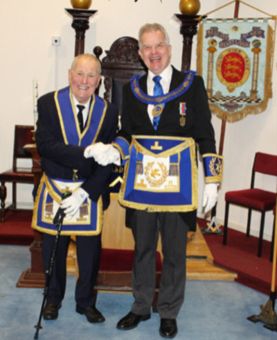 John Youldon (left) being congratulated by Stuart Boyd.