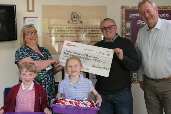 Pictured from left to right, are: (standing) Mrs Bould, Sam Hodgson and Ken Needham, with children from Poulton-le-Sands School in the foreground Pictured from left to right, are: (standing) Mrs Bould, Sam Hodgson and Ken Needham, with children from Poulton-le-Sands School in the foreground