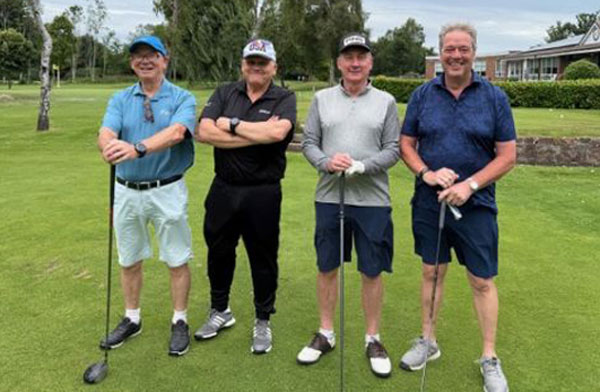 Pictured from left to right, are: Phil Pattullo and Geoff Brown, with visitors.