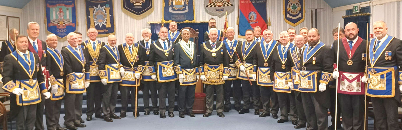 Cobarsanellore Ramesh (centre) and Mark Matthews (centre right) with grand officers and acting Provincial grand officers.