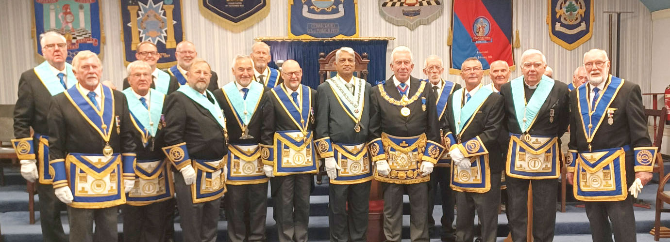 Mark Matthews (centre right), Cobarsanellore Ramesh (centre), John Cross (centre left) with the members of Bispham-with-Norbreck Lodge.