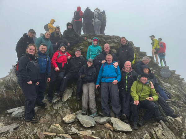 Pictured from left to right, are: John Holmes with members of the Royal Preston Hospital team at the summit of Snowdon.