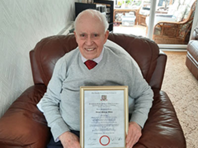 Vic Albin with his certificate.