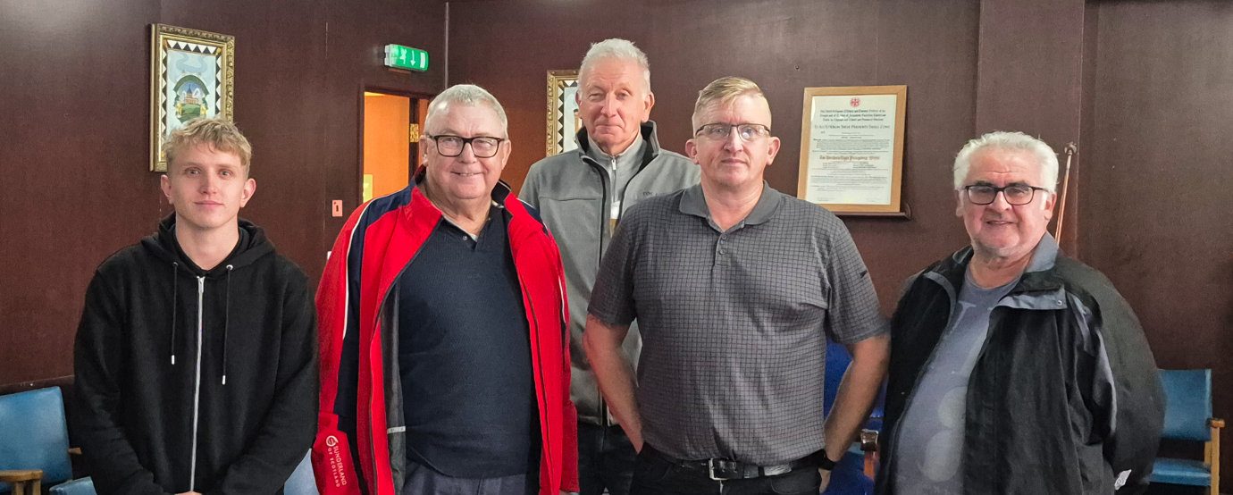 Pictured from left to right, are: James Drake, Jim Gregson, Phil Drake with two visitors.