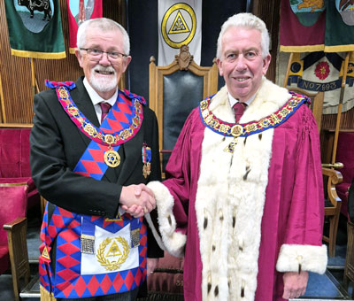 David Barr (left) being congratulated by Mark Matthews.