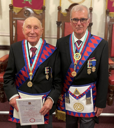 Phil Adshead (left) being congratulated by John Selley. Phil Adshead (left) being congratulated by John Selley.