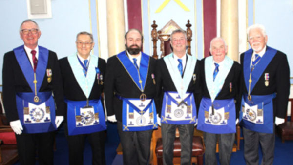 Ezra (centre left) and David (centre right) flanked by officers of Dona Conferentes Lodge. Ezra (centre left) and David (centre right) flanked by officers of Dona Conferentes Lodge.