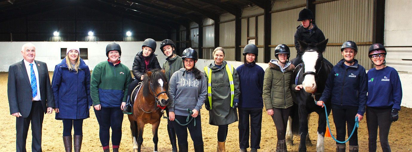 Sunday morning class including coaches, assistants, Luke on Bo-Peep and Tobias on Bobby along with Trafford Group Chairman Patrick Walsh.