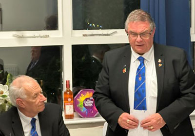 Immediate past master John, gives a toast to Stewart. Immediate past master John, gives a toast to Stewart.