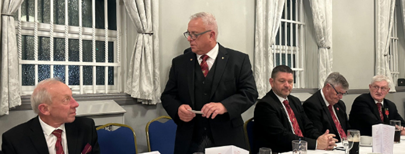 John Topping delivers a toast to Red Triangle Chapter. 