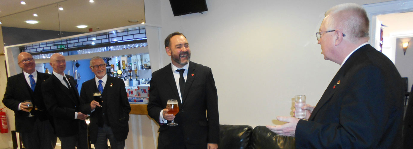 John Murphy (right) at the drink’s reception toasts WM.