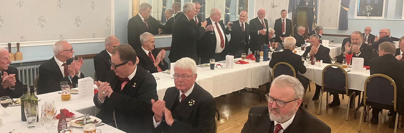 Mark taking wine with the three principals and the companions.