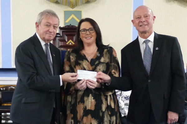 Pictured from left to right, are: Sir Peter Roscow KLB, Samantha Ashcroft and head injury survivor Tim Walton.