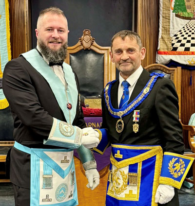 Kieran Taylor-Bradshaw (left) with principal guest David Thomas.