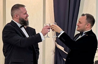 Adam Dennettt and Kieran Taylor-Bradshaw toasting.