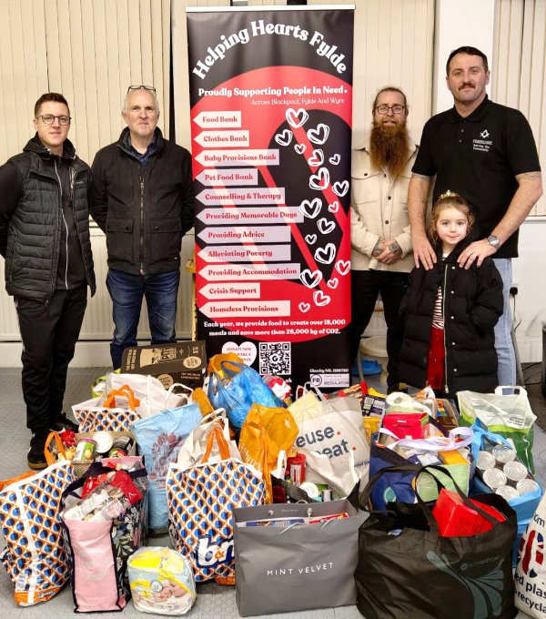 Pictured from left to right, are: Jordan Brown, Andrew Mills (CEO of Helping Hearts), Luke Bodenham and David Jenkinson with the food donation for Helping Hearts Fylde.