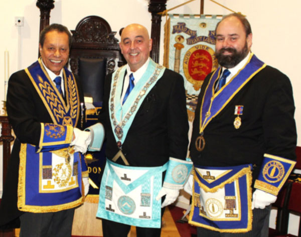 Andy (left) congratulates new WM Rick on his installation, watched by Ezra McGowan. Andy (left) congratulates new WM Rick on his installation, watched by Ezra McGowan.