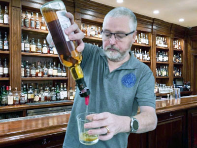 Dave Rigby pours a wee dram.