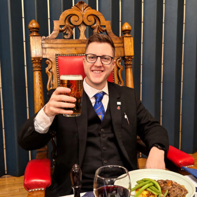 Senior warden Jordan Brown enjoys a pint with his meal.