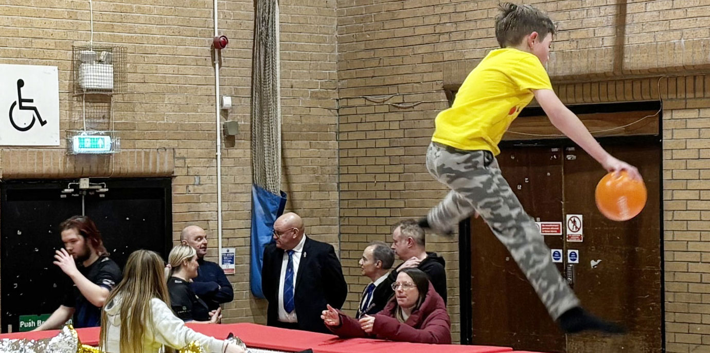 Standing round the trampoline, are; Jonathan Heaton (third right) and David Bishop (centre) talking with TAAG volunteers, finding out just what the grant means to them. Standing round the trampoline, are; Jonathan Heaton (third right) and David Bishop (centre) talking with TAAG volunteers, finding out just what the grant means to them.
