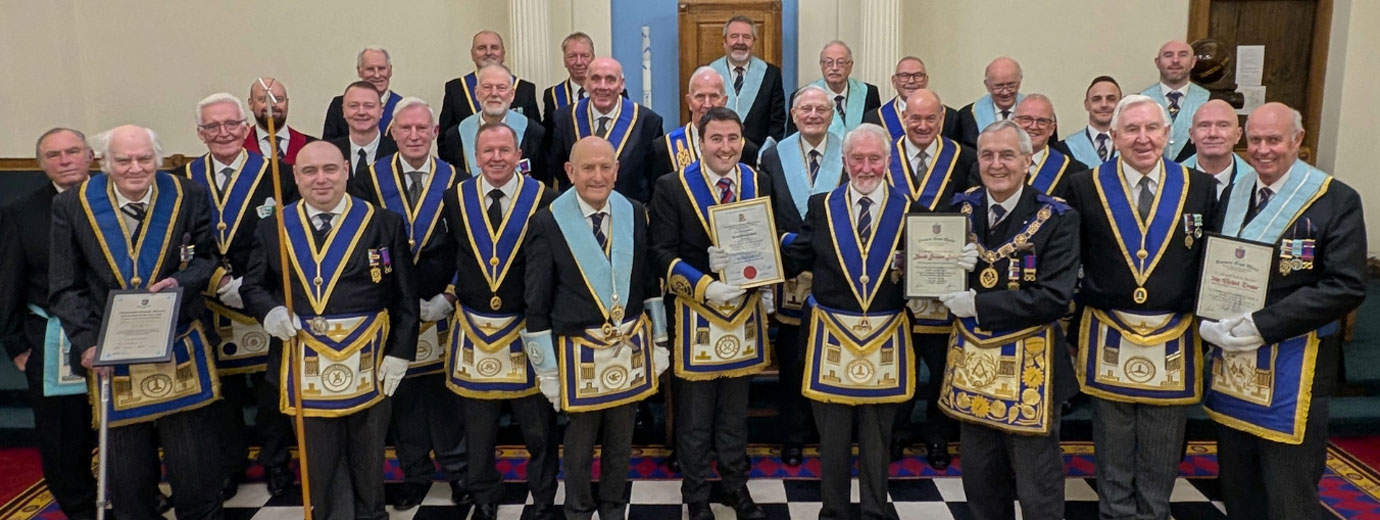 Pictured second right on the front row: Bernard Bailey flanked by John Lockley (Bernard’s right) and Mick Southern, with the brethren of Gordon Lodge and Lodge of Harmony.