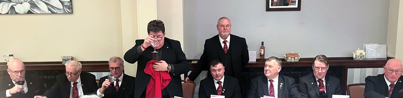 Canon John Hall takes wine with all.