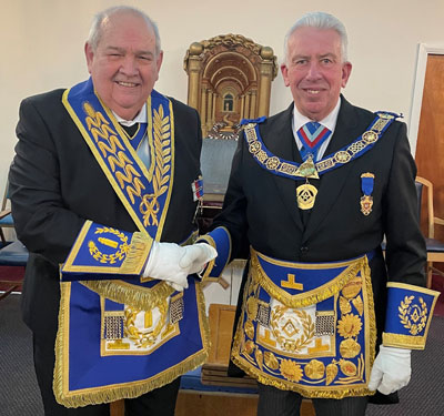 Phil Gunning (left) being congratulated by Mark Matthews.