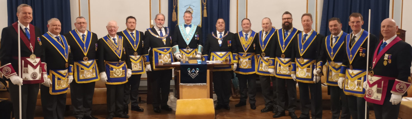 Richard Dennison (centre) with Frank Umbers (centre left), Michael Tax (centre right) with grand and acting Provincial grand officers. Richard Dennison (centre) with Frank Umbers (centre left), Michael Tax (centre right) with grand and acting Provincial grand officers.