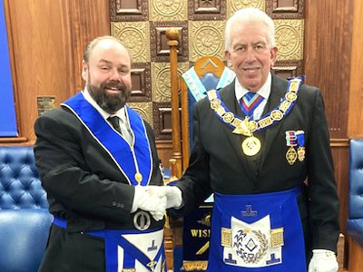 Ezra McGowan (left) is congratulated by Mark Matthews.