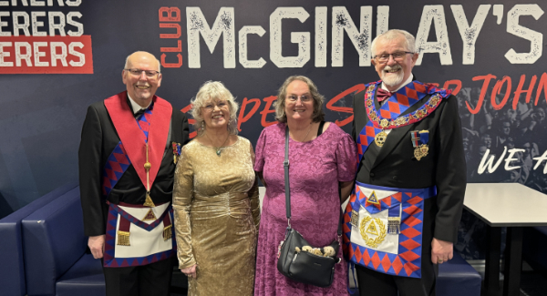 David Barr (right) with Helen and guests. 