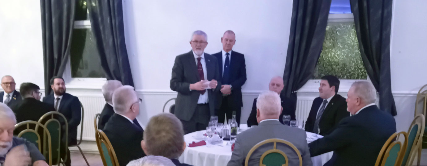 David Barr (standing left) responding to the toast.