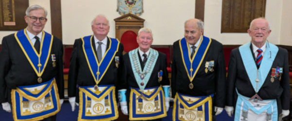 Mike Moore, (centre) with his friends