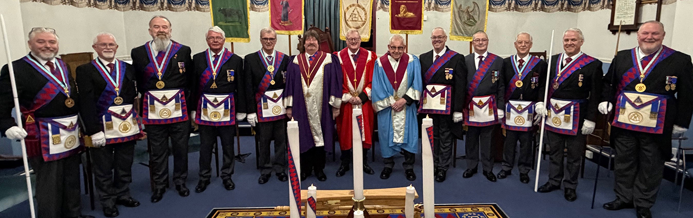 The three principals (centre) flanked by acting Provincial grand officers and Wigan and Leigh Group chairman and deputy chairman