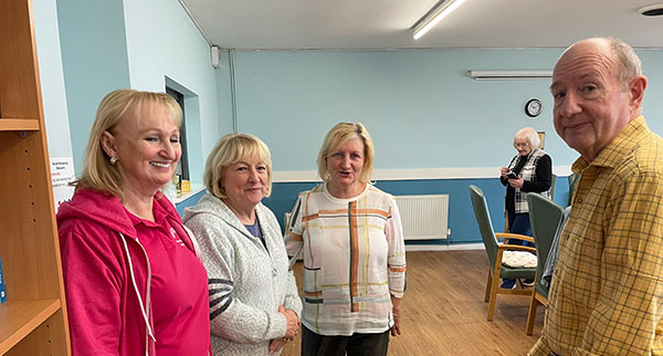 John Gibbon with Jackie Lucock (left) and colleagues of Breast Mates. John Gibbon with Jackie Lucock (left) and colleagues of Breast Mates.