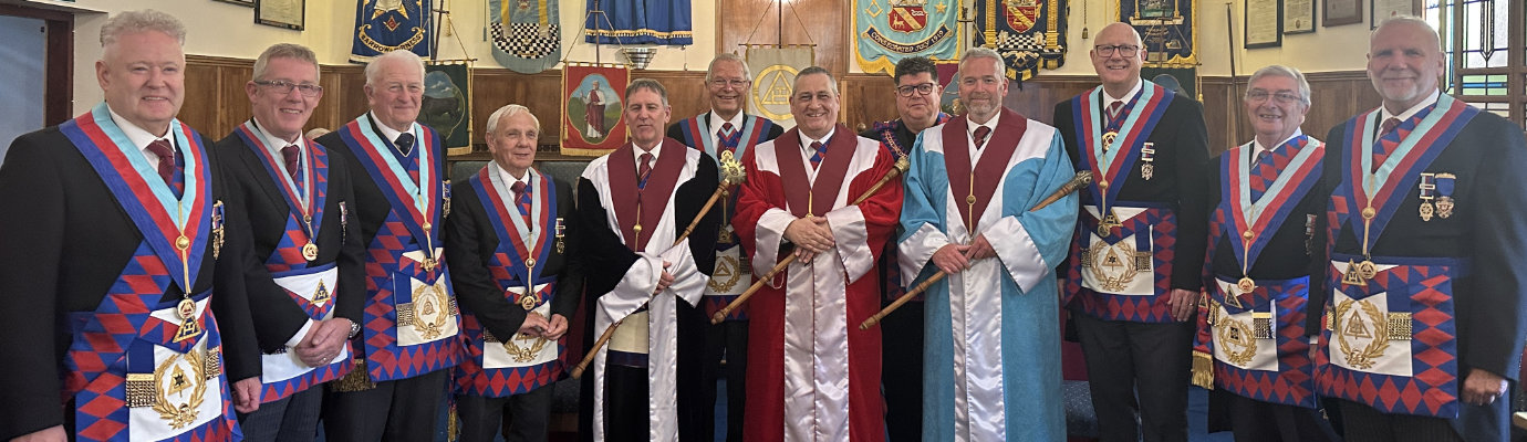 The three principals (centre), with grand officers and the Furness and South Lakeland Group Executive