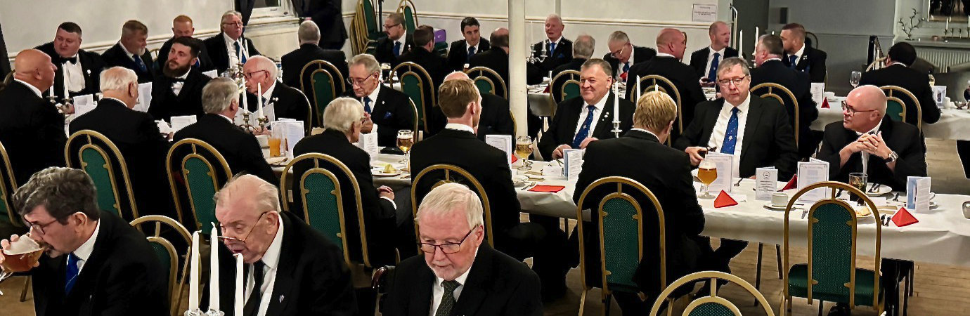 Brethren at a packed festive board. Brethren at a packed festive board.