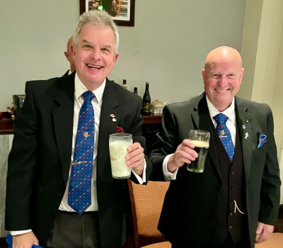 Stuart Boyd )left) proposes a toast John Thompson. Stuart Boyd )left) proposes a toast John Thompson.