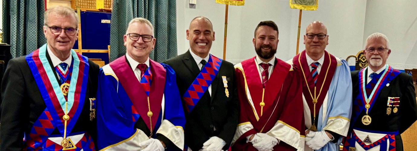 The three Principals toast John Selley (left) at the festive board. Pictured from left to right, are: John Selley, Chris Williams, Paul Park, Philip Barr, Phil Hughes and Paul Brunskill.